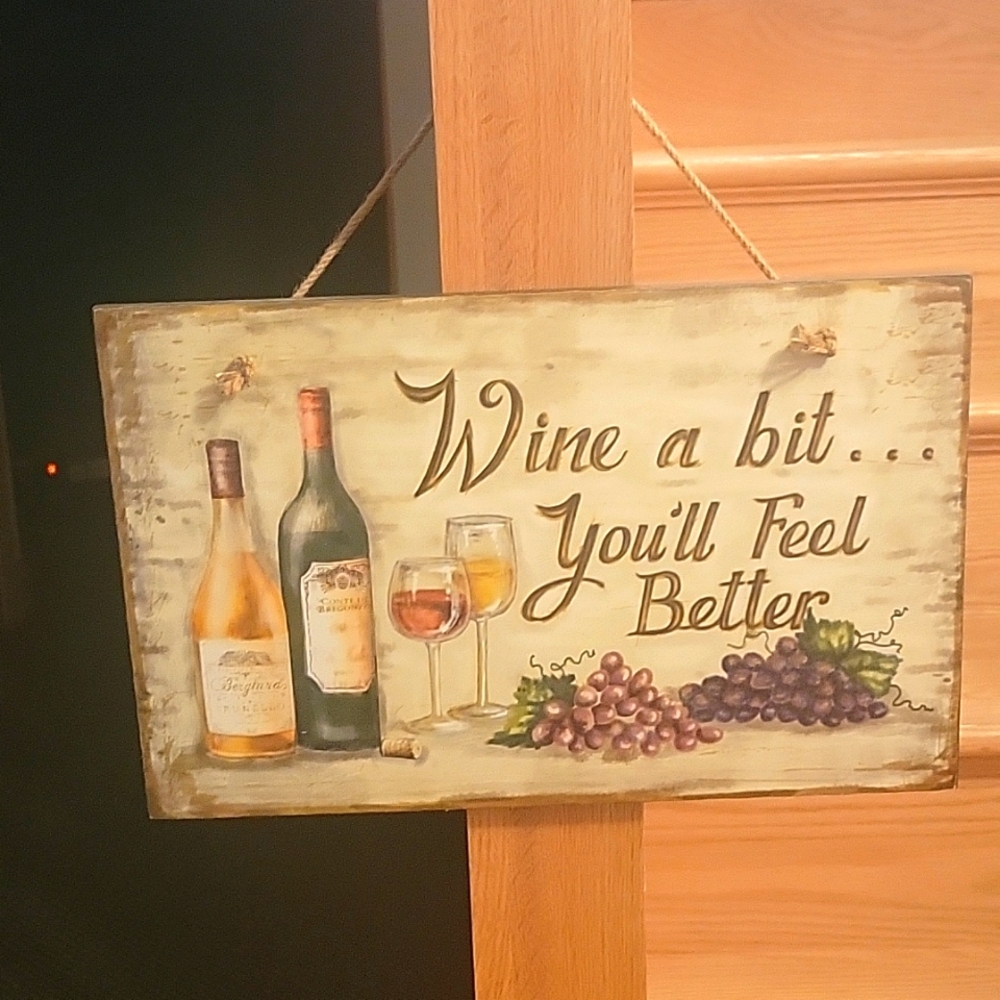 "Wine a bit..You'll feel better wooden wall hanging..never used